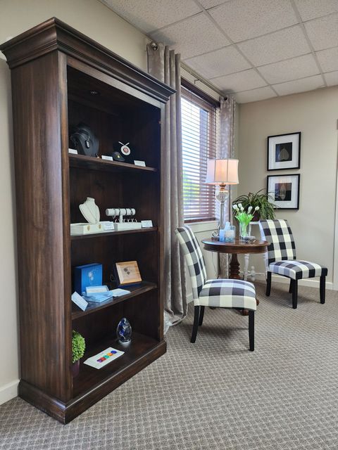 Display cabinet with jewelry and keepsakes