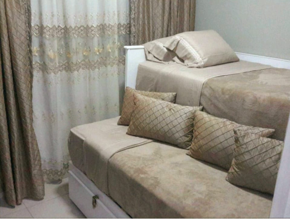 Dormitorio en Cozy Condo 9 en My Cozy Condos en Jaco, Costa Rica