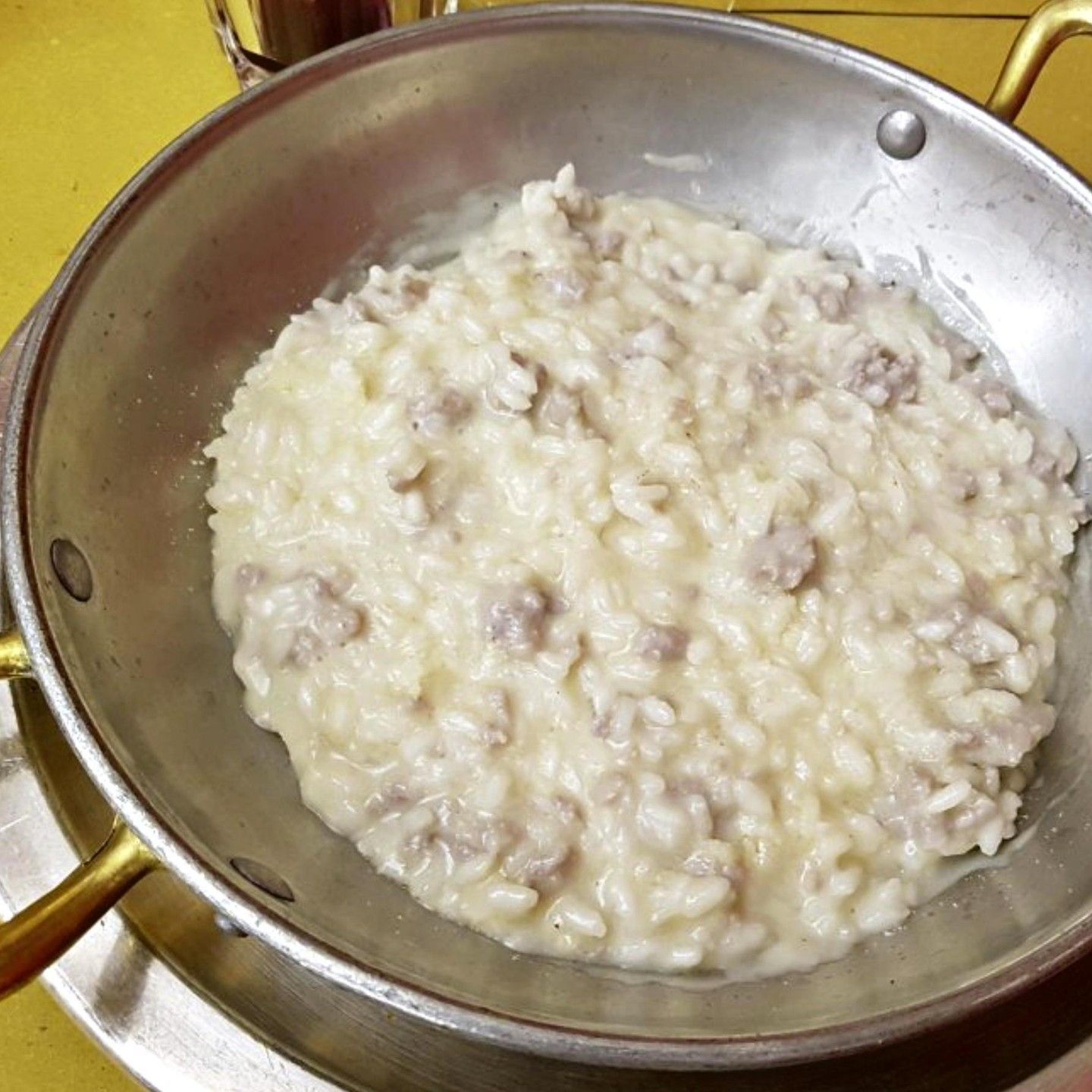Close-up of a pan full of rice and meat
