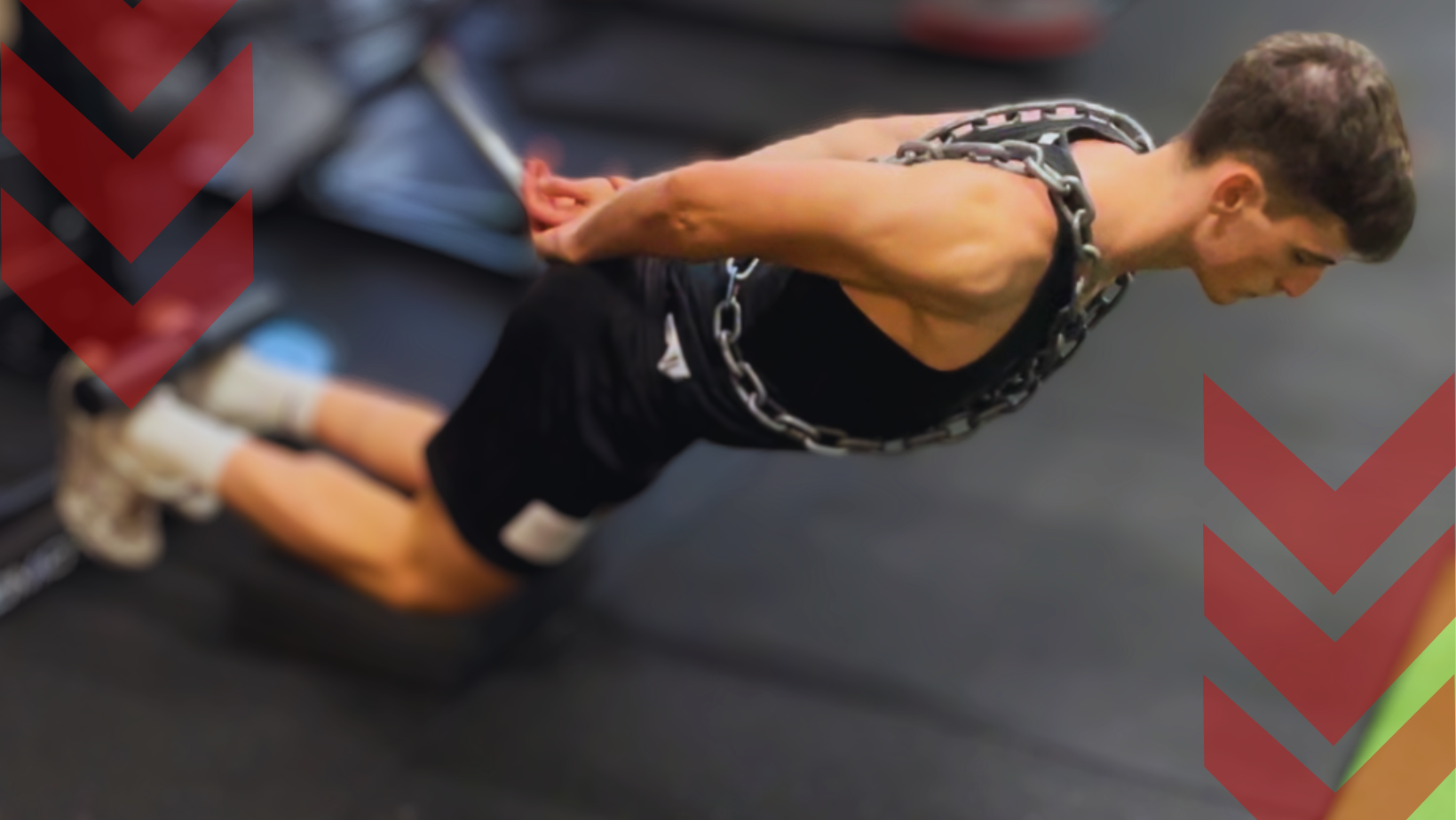 Person performing weighted back extension exercise at a gym.