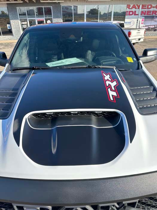 White and black RAM TRX truck hood with 
