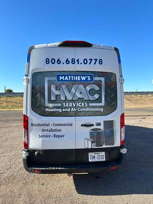 White van with blue accents, branded 