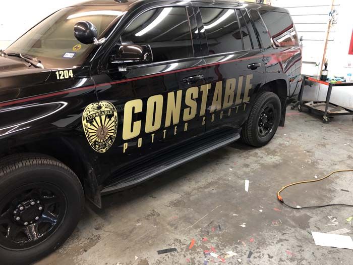 Black Constable vehicle in garage; 