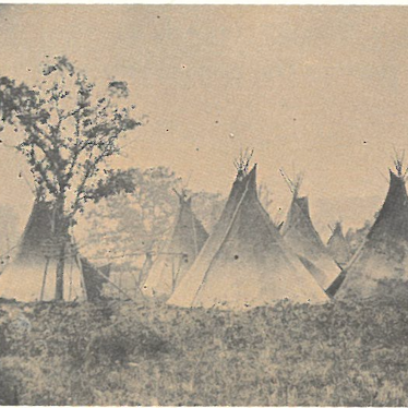 Sepia-toned scene of several teepees in a grassy campsite beside a tree