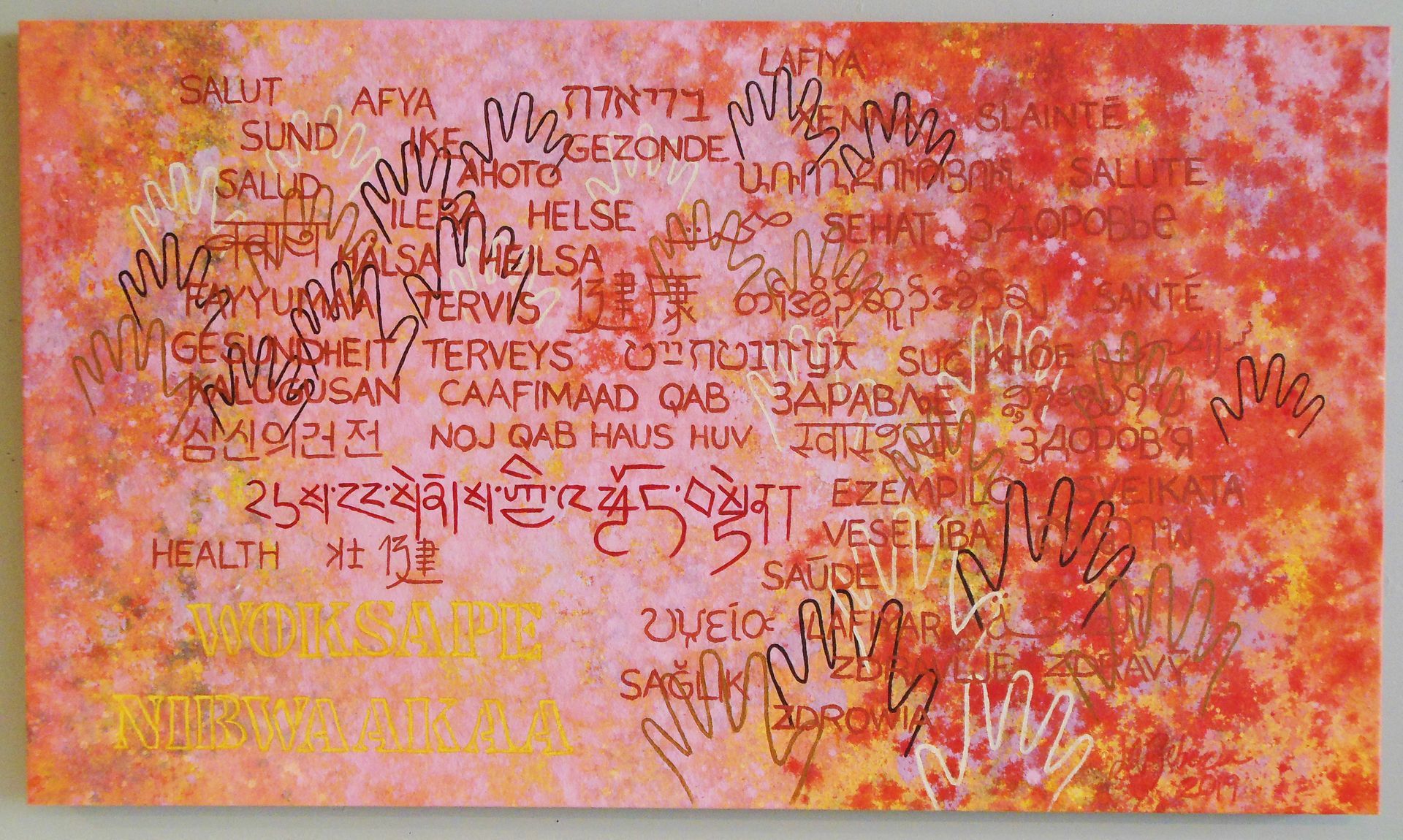 Orange-red abstract painting with layered handwritten words and symbols scattered across the canvas