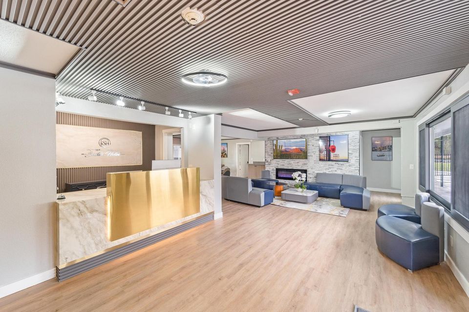 There is a reception desk in the middle of the room.