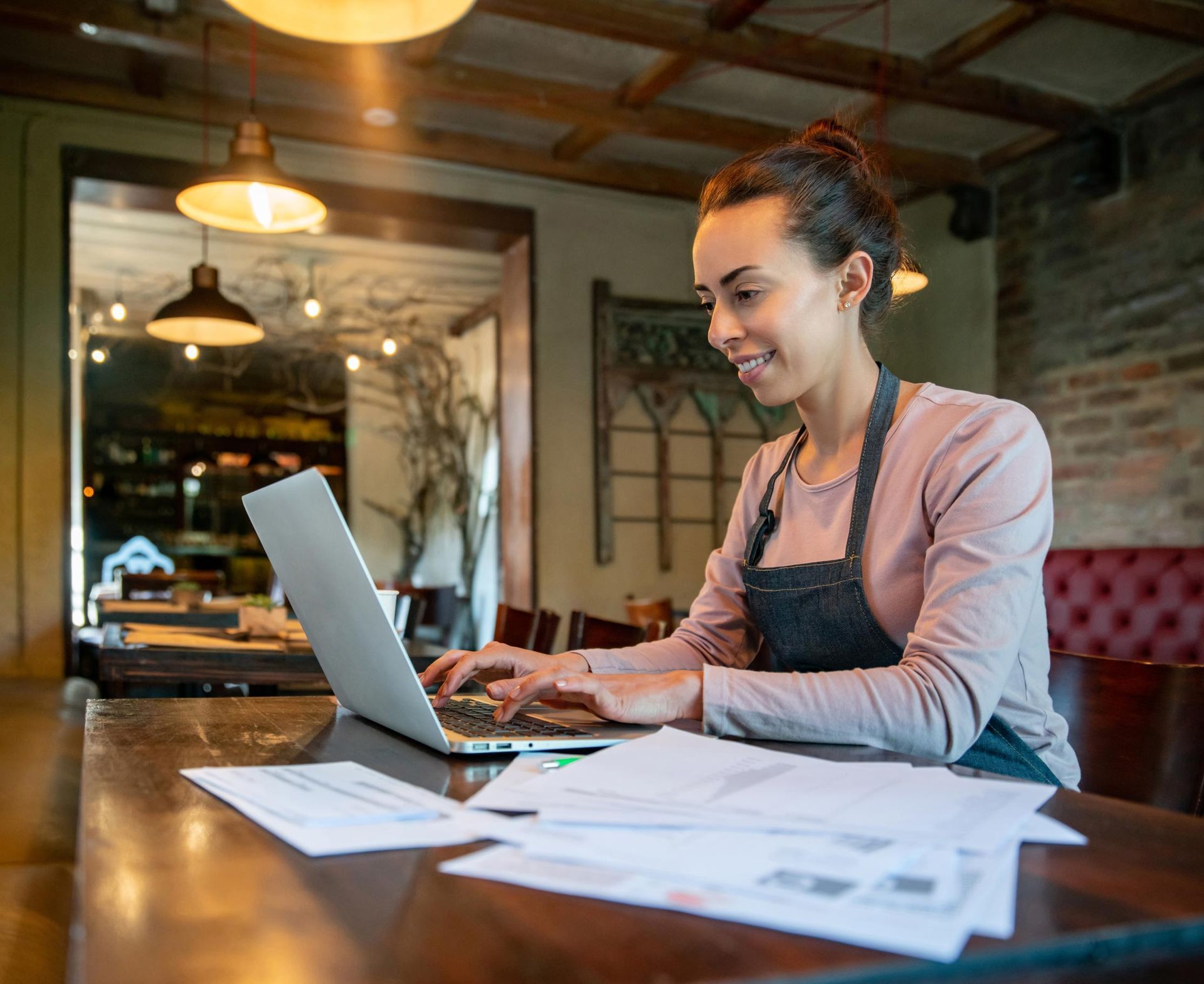 Woman Using Laptop — Fairfield, OH — Tax Man Associates