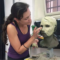 Awardee Kapi Monoyios works on a sculpture.