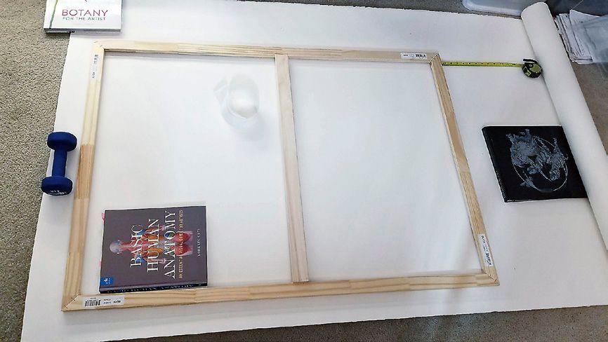 Figure 4: 48 x 36 inch watercolor canvas setup: ARCHES® 140lb Cold Pressed watercolor paper measured and laid out, 3 inch overlapping the stretcher bars, sprayed paper with water, carefully fold and staple paper onto the bars, and allow paper to fully dry and become taut. Figure 4: 48 x 36 inch watercolor canvas setup: ARCHES® 140lb Cold Pressed watercolor paper measured and laid out, 3 inch overlapping the stretcher bars, sprayed paper with water, carefully fold and staple paper onto the bars, and allow paper to fully dry and become taut.