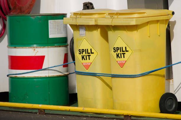 Two Yellow Spill Kits Are Sitting Next To Each Other — Accidental Health & Safety NQ & Mt Isa In Mt Isa, QLD