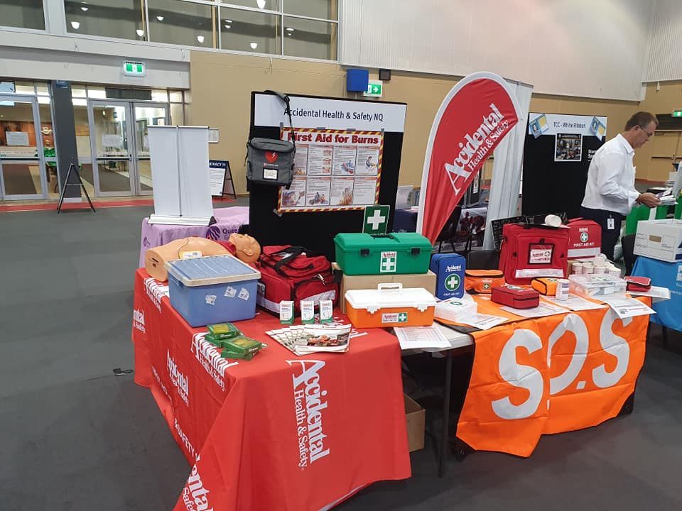 First Aid Kit Products On Table — Accidental Health & Safety NQ & Mt Isa In Ingham, QLD