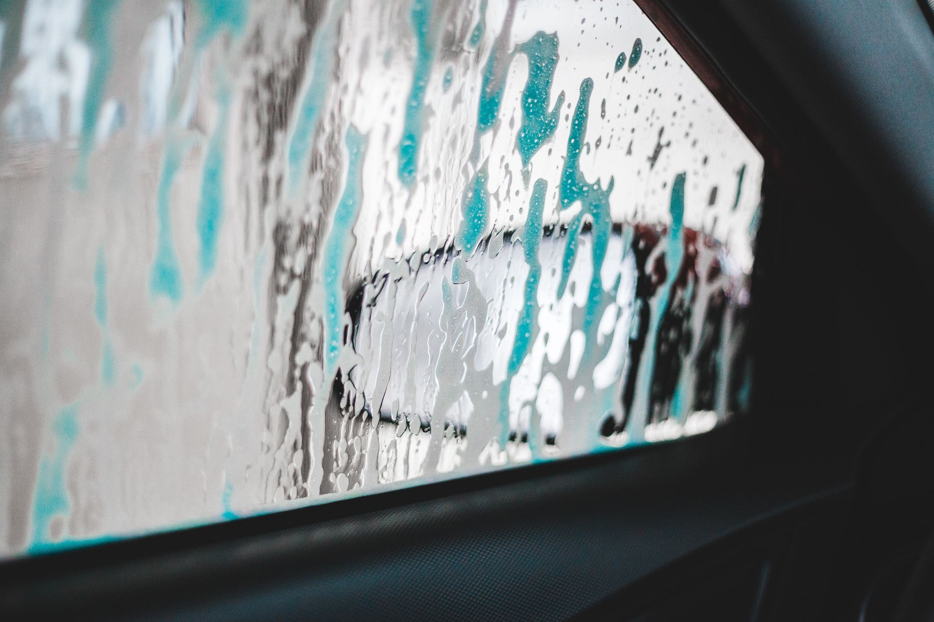 Pinckney car wash in Michigan, exterior express carwash with a tropical theme