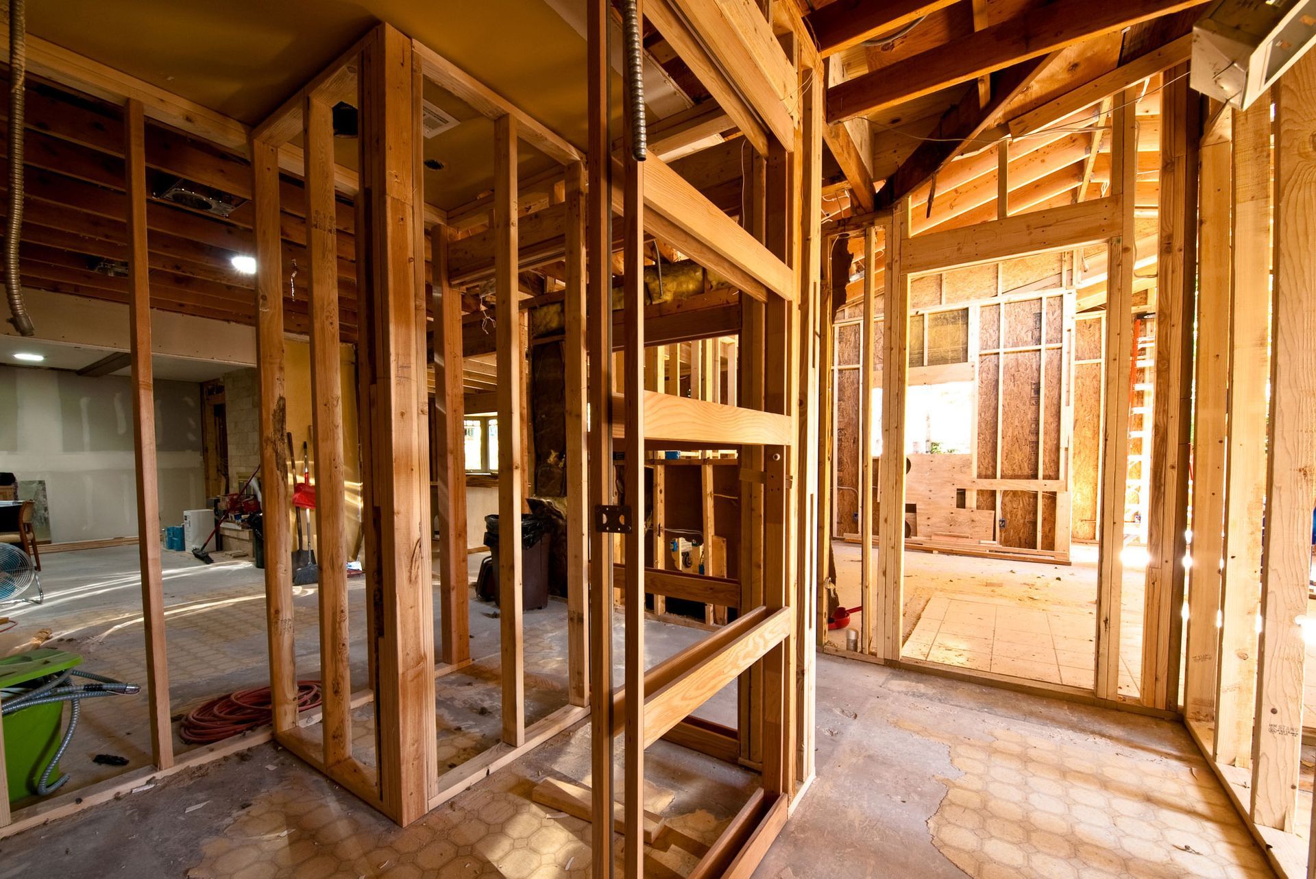 A room in a house under construction with wooden frames.
