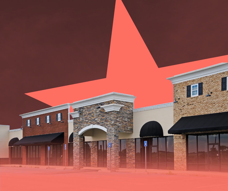 Commercial buildings with a large red star overlay.