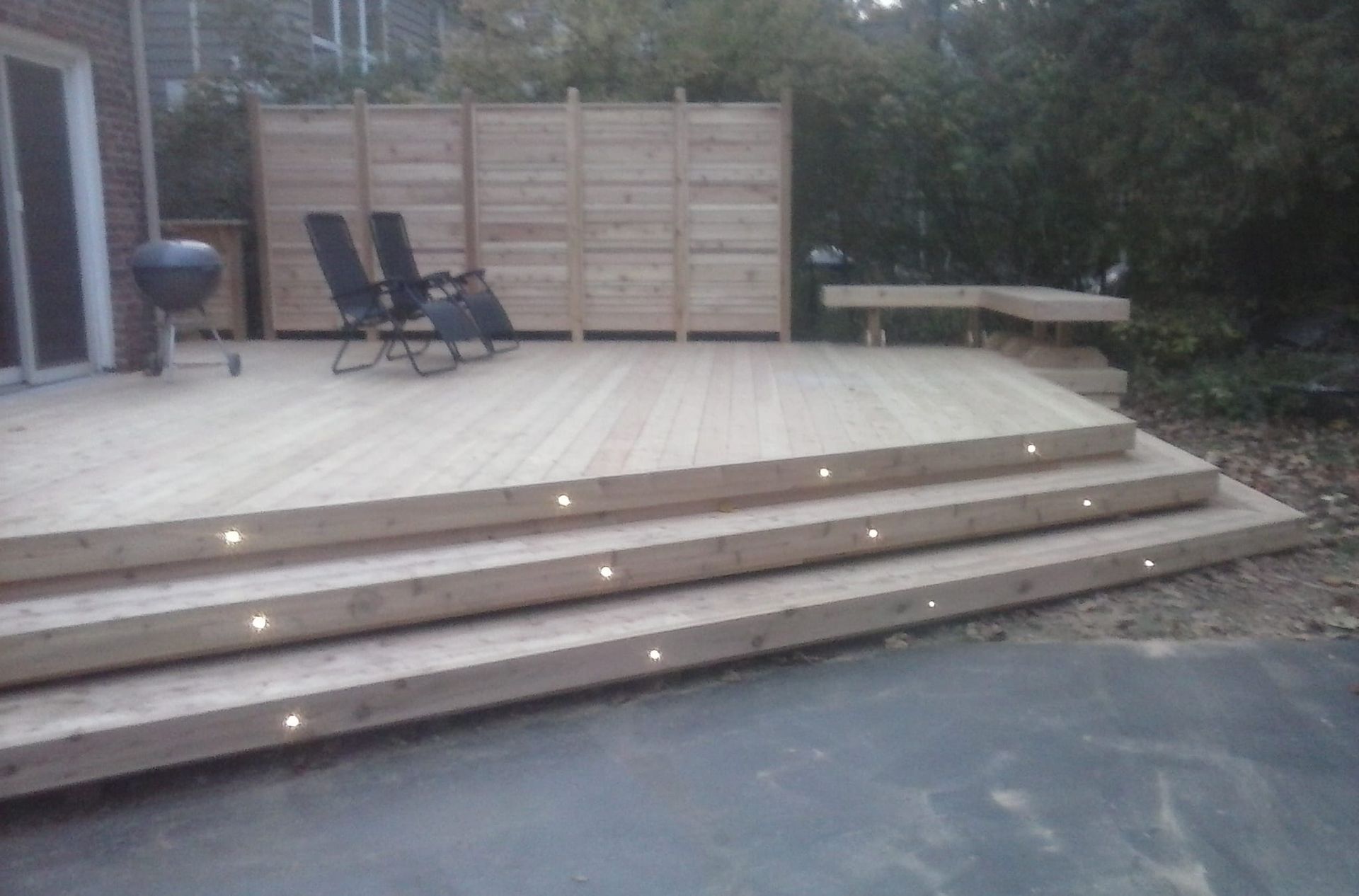 exterior update to make home better with newly installed wood and lights