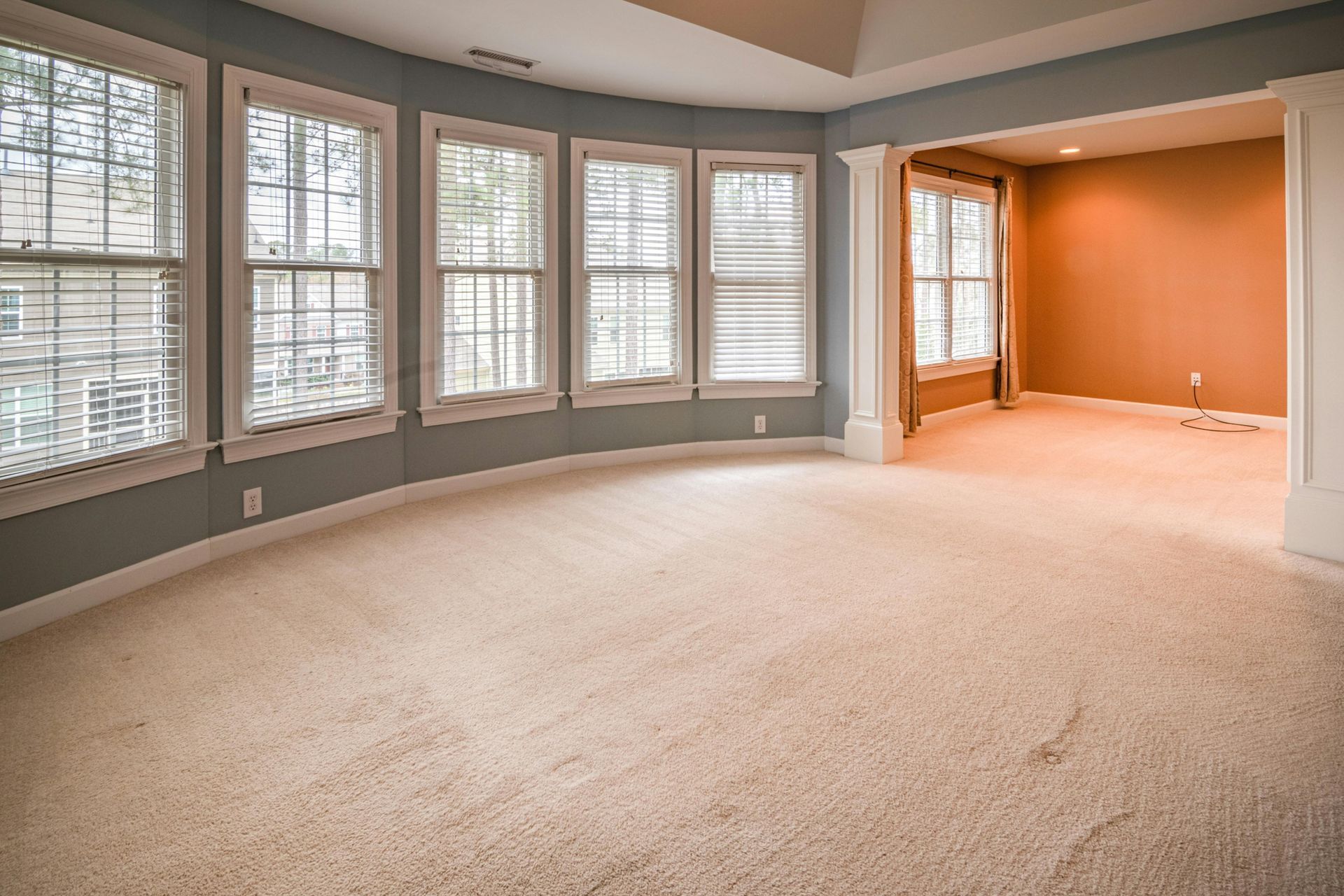 House addition creating seamless interior integration with consistent window trim and natural light