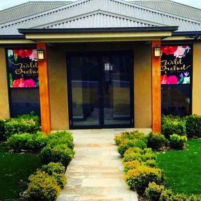 A House With A Sign That Says Wild Orchid — McKnight Signs In Hillvue, NSW