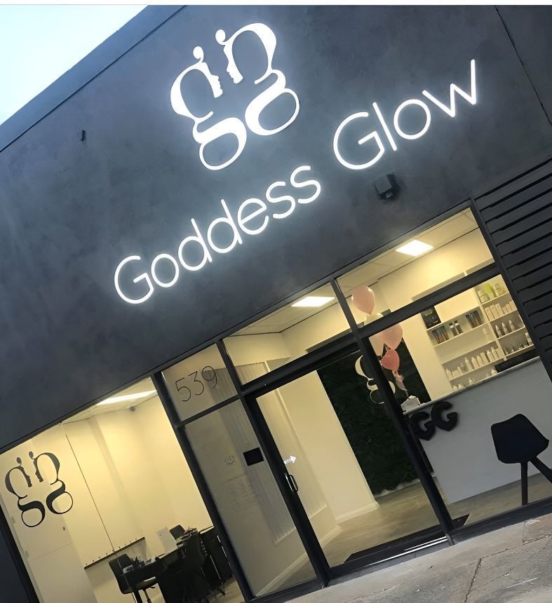 The front of a store called goddess glow — McKnight Signs In Hillvue, NSW