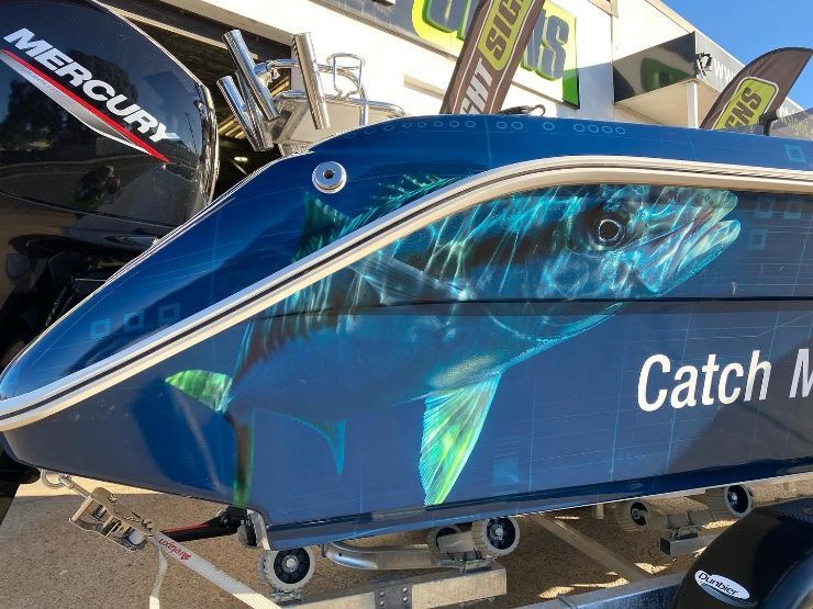 A Blue Boat With A Picture Of A Fish And The Word Catch On It — McKnight Signs In Hillvue, NSW
