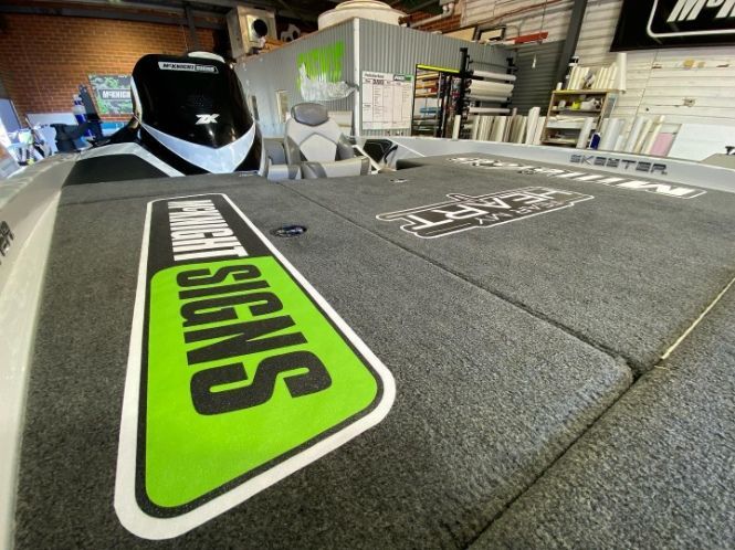A Boat With The Word Signs On The Floor — McKnight Signs In Hillvue, NSW