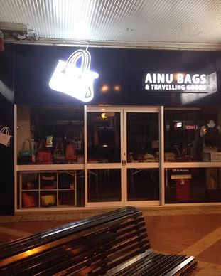 A Store Front With A Lightbox — McKnight Signs In Armidale, NSW