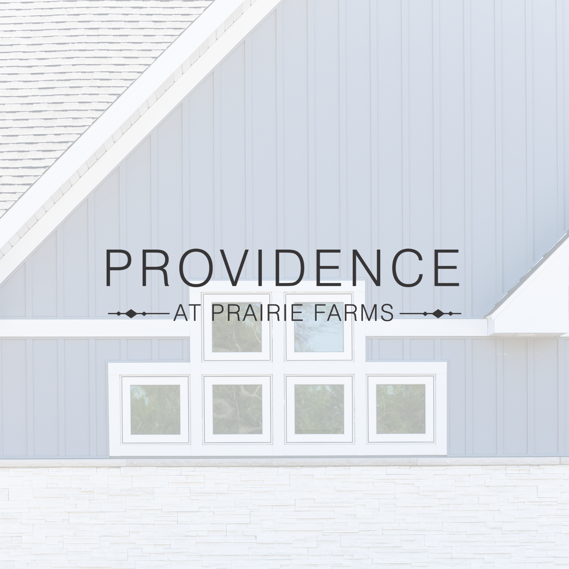 Bright living room with stone fireplace and TV, overlaid text reading “Providence at Prairie Farms.”