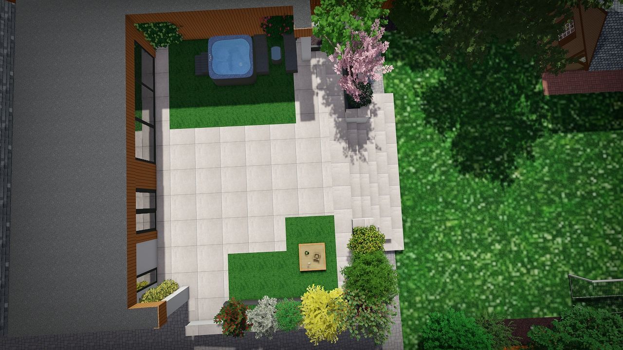 Top-down view of a patio with a hot tub, landscaping, and a grassy area.