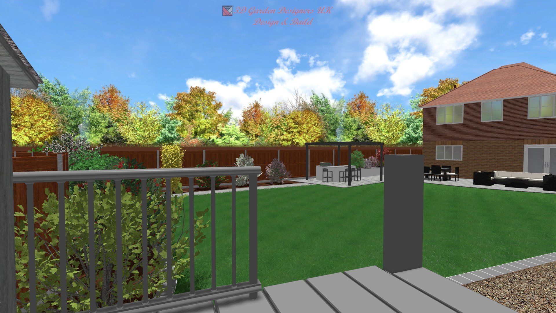 Backyard view: deck, green lawn, trees, dining set, and house under a blue sky.