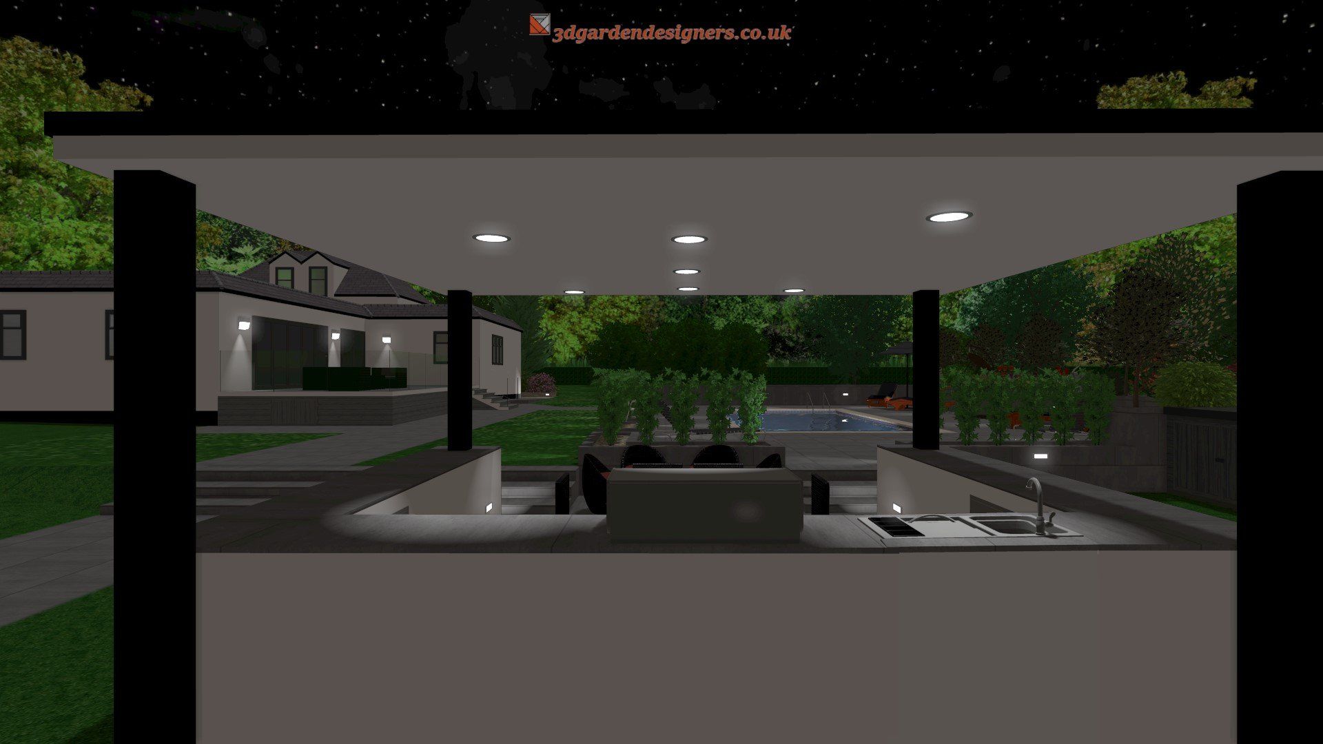 Outdoor kitchen at night, with countertop, sink, and grill. View of a house and pool in the background.
