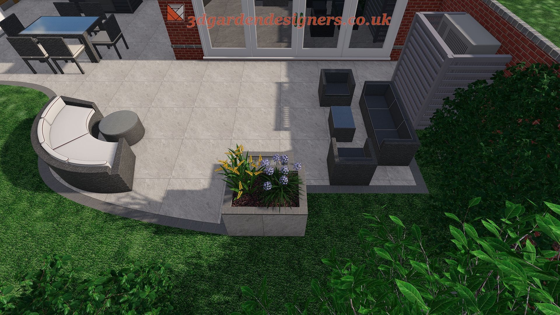 Patio with outdoor furniture, including a sofa, chairs, and table, with a flower bed and greenery.