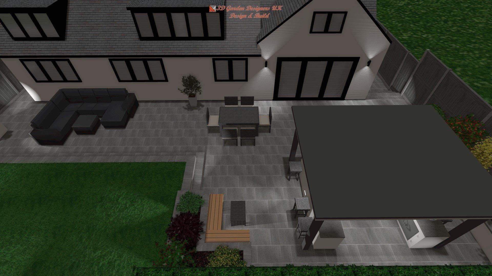 Overhead view of a modern backyard patio with gray pavers, a dining set, and an outdoor kitchen under a canopy.