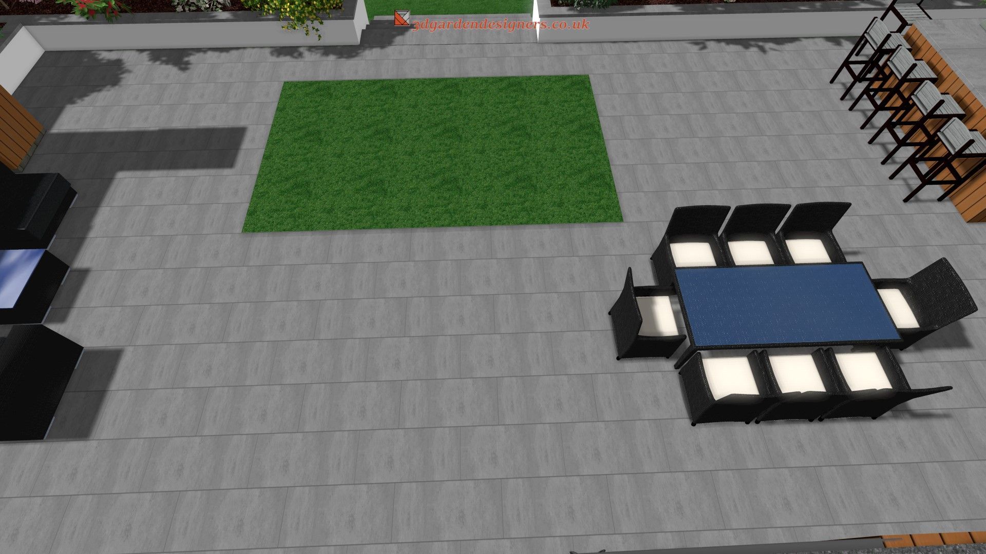 Overhead view of a patio with a table and chairs, a grassy area, and a kitchen area.