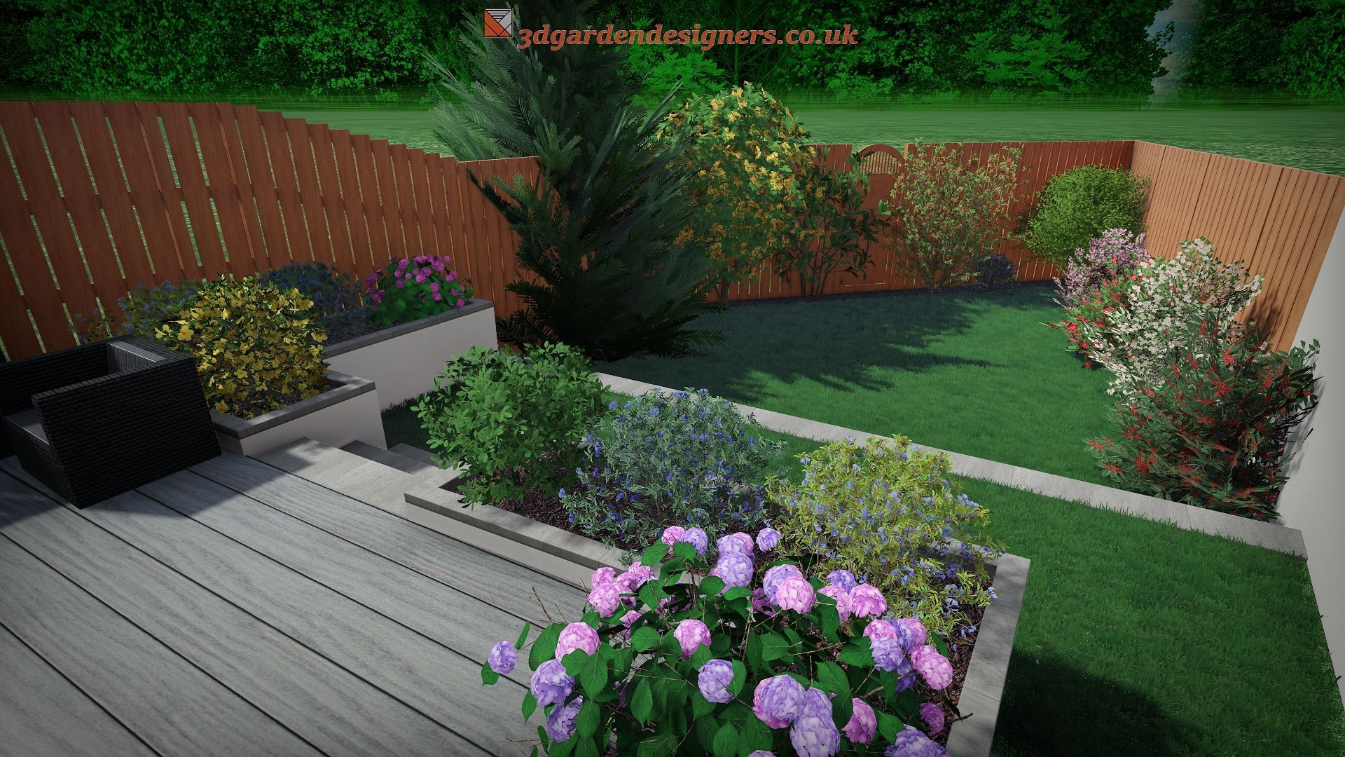 Backyard with wooden deck, lawn, and landscaped flowerbeds enclosed by a wooden fence.