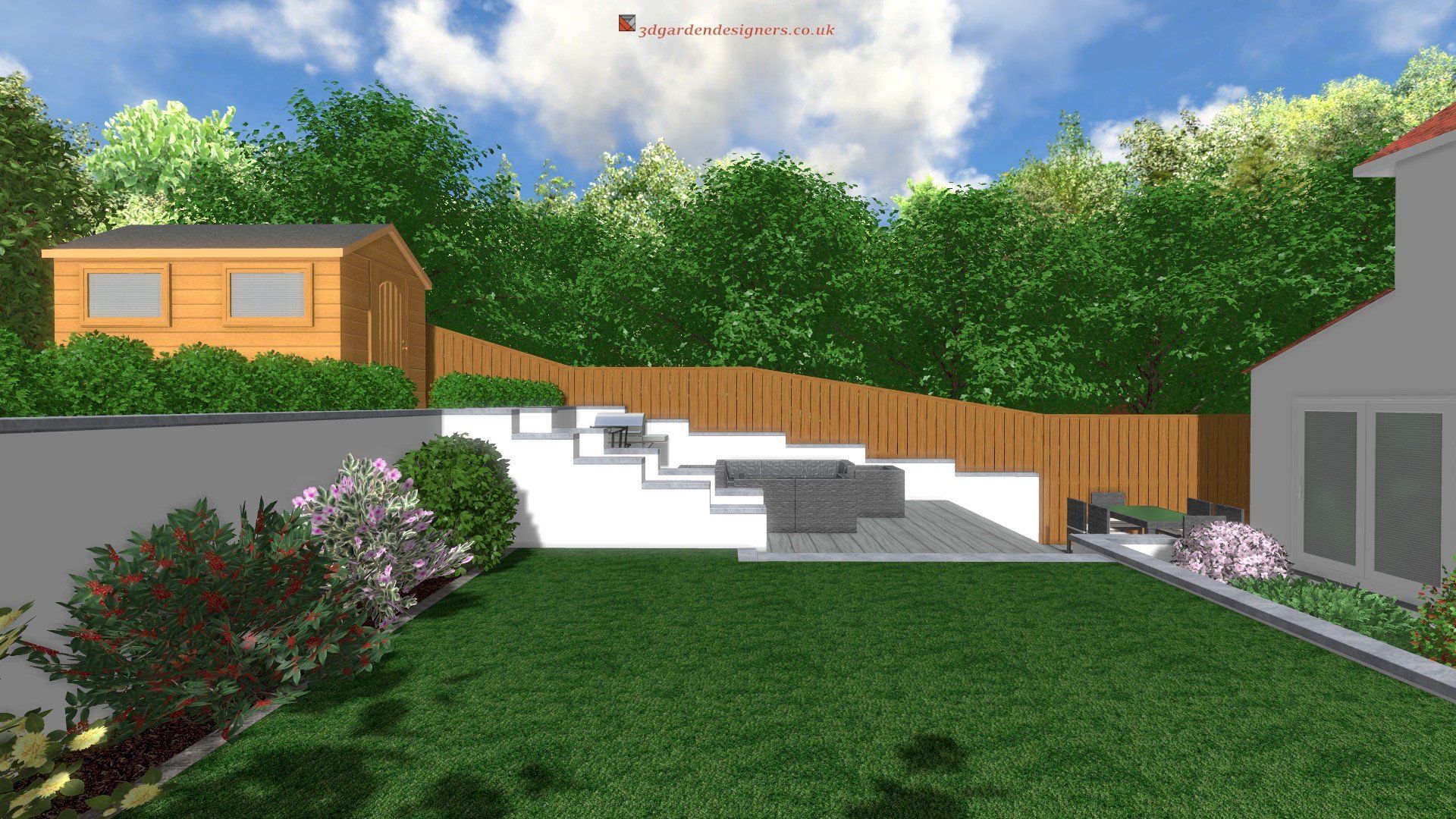 Backyard with shed, tiered seating area, wooden fence, and lush green lawn against a blue sky.