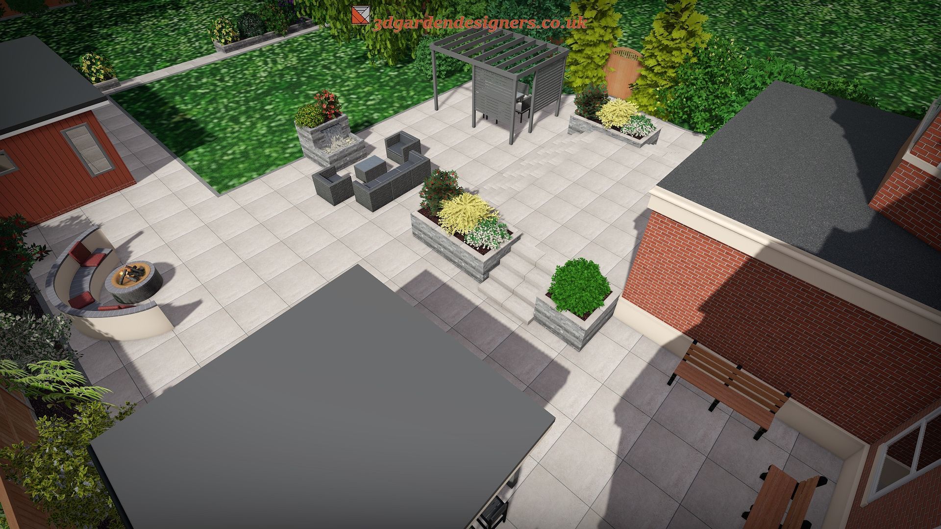 Overhead view of a modern patio with gray paving stones, outdoor furniture, and planters, surrounded by brick buildings and greenery.