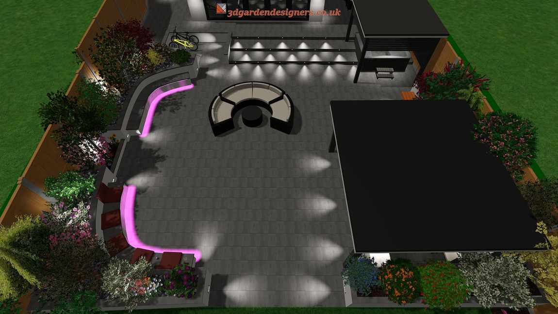 Overhead view of a modern backyard with a dark-roofed structure, seating area, and illuminated garden beds.