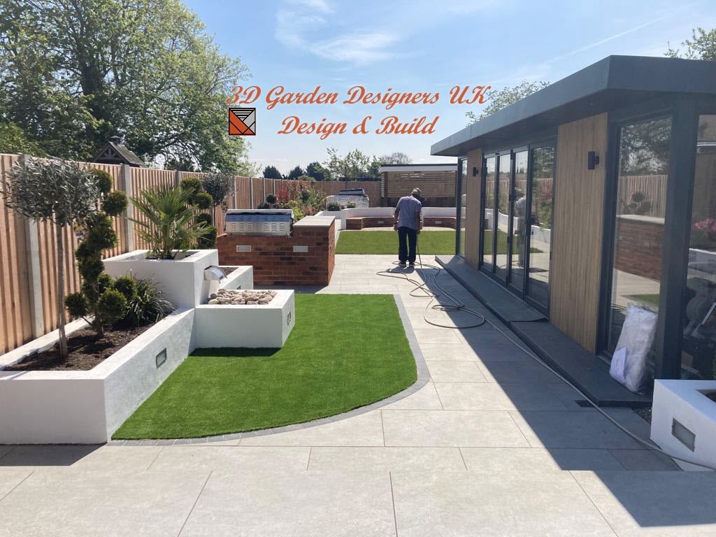Modern garden design with a patio, artificial lawn, and outdoor kitchen.