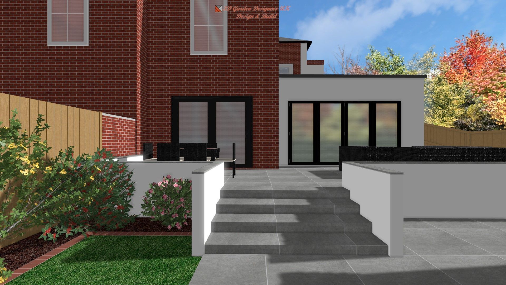 Backyard with steps leading to a modern extension with glass doors and a red brick house.