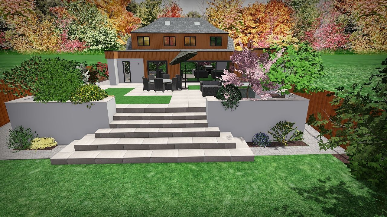 Terraced backyard with steps leading to a patio, house in the background, surrounded by colorful autumn foliage.