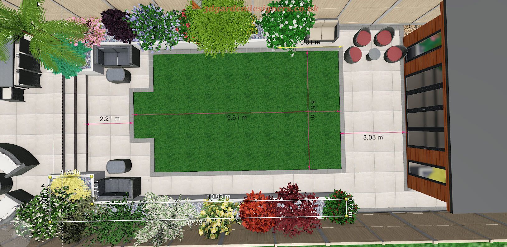 Overhead view of a patio with a grass area, seating, and various plants.