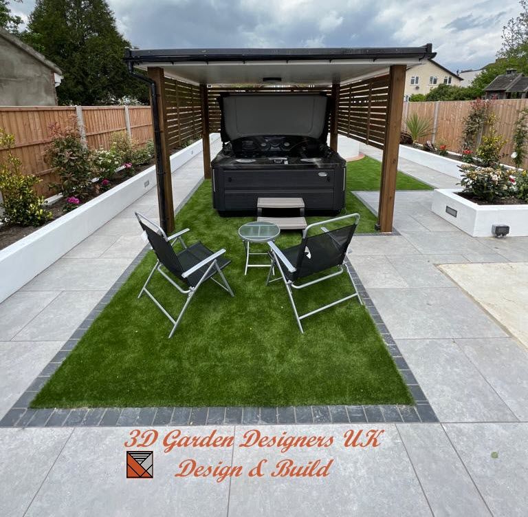Hot tub under a pergola on artificial grass, flanked by planters and gray paving stones.