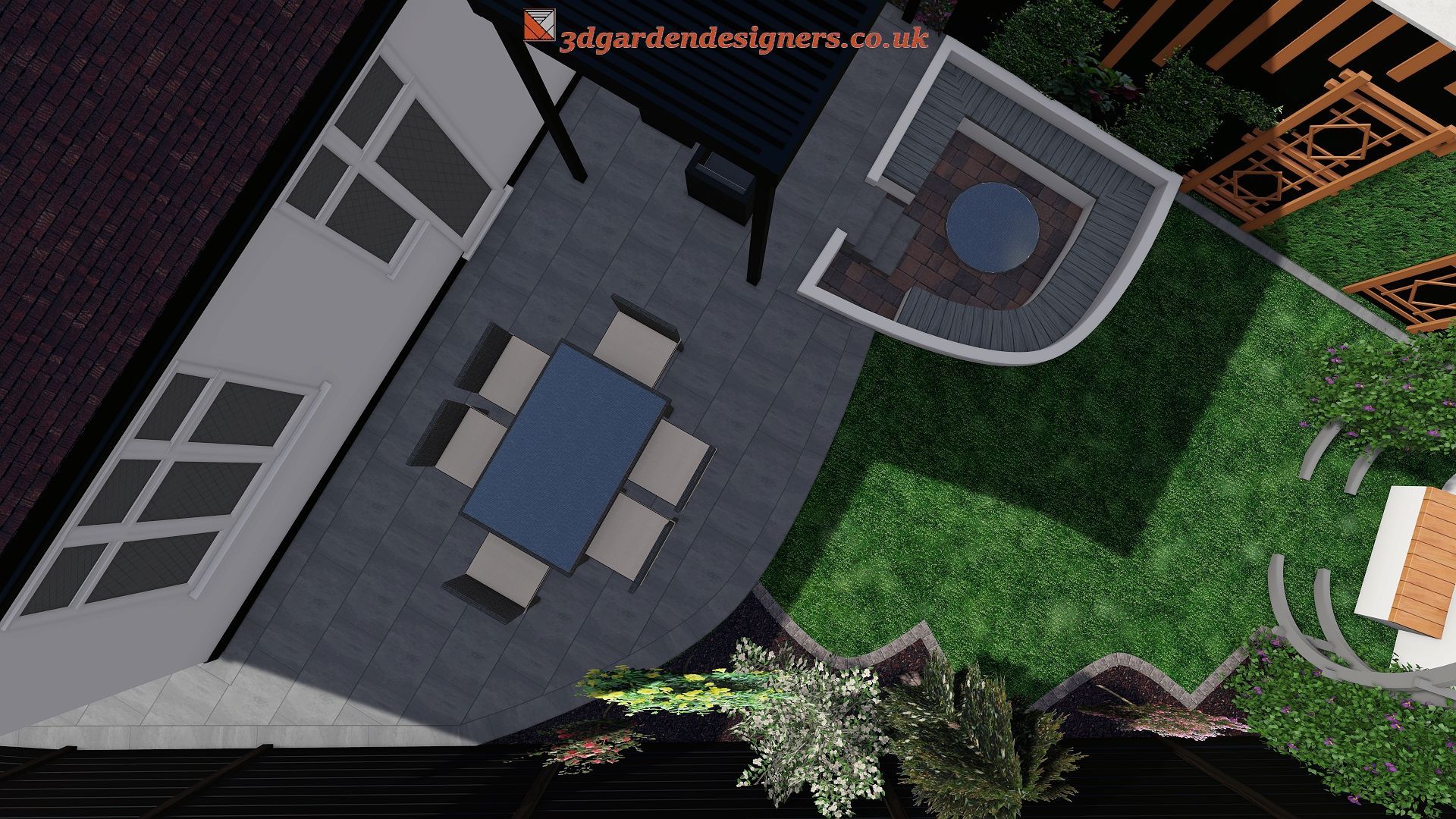 Overhead view of a modern backyard design with a patio, dining area, and fire pit on green lawn.