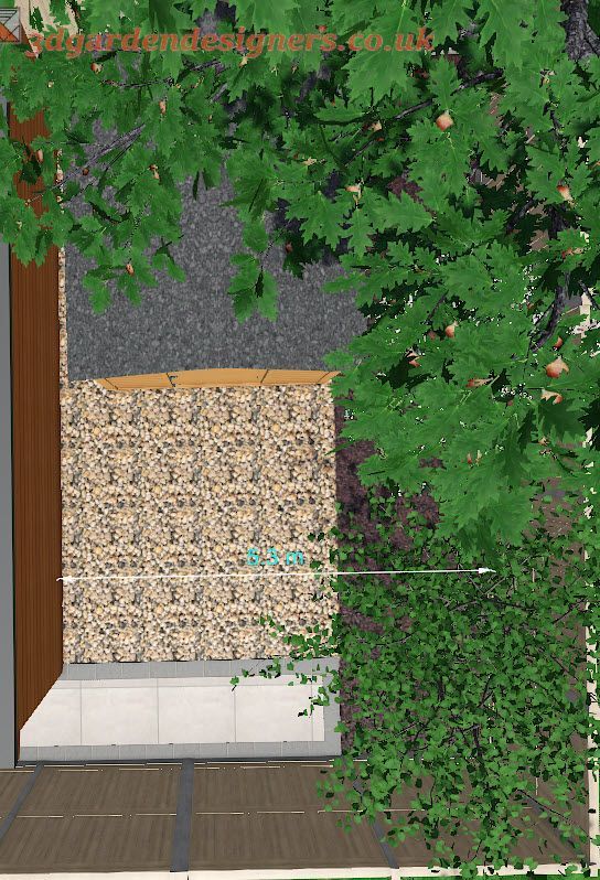 Overhead view of a small garden with stone wall, gravel area, plants, and a tree providing shade.