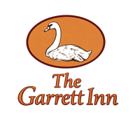 Logo for The Garrett Inn with a white swan in an orange oval above the text