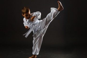 White Belter Boy doing a High Kick