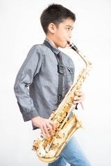 Boy playing Saxophone