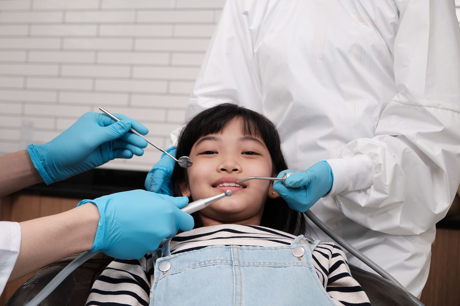 A young girl prepping for Dental procedures