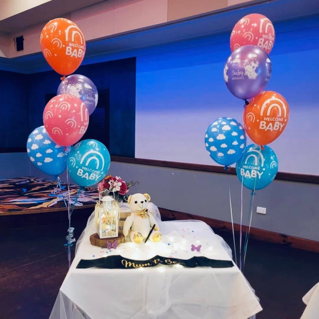 Balloons and Teddy Bear Decorate a Table for a Baby Shower — Creative Events Innisfail in Innisfail, QLD