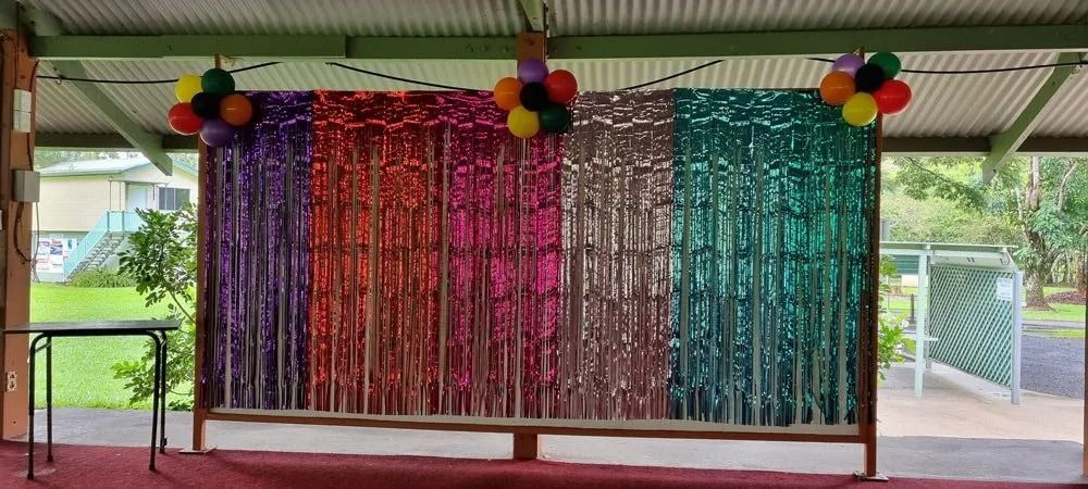 Colorful Foil Curtains on a Wooden Frame, Decorated — Creative Events Innisfail in Innisfail, QLD