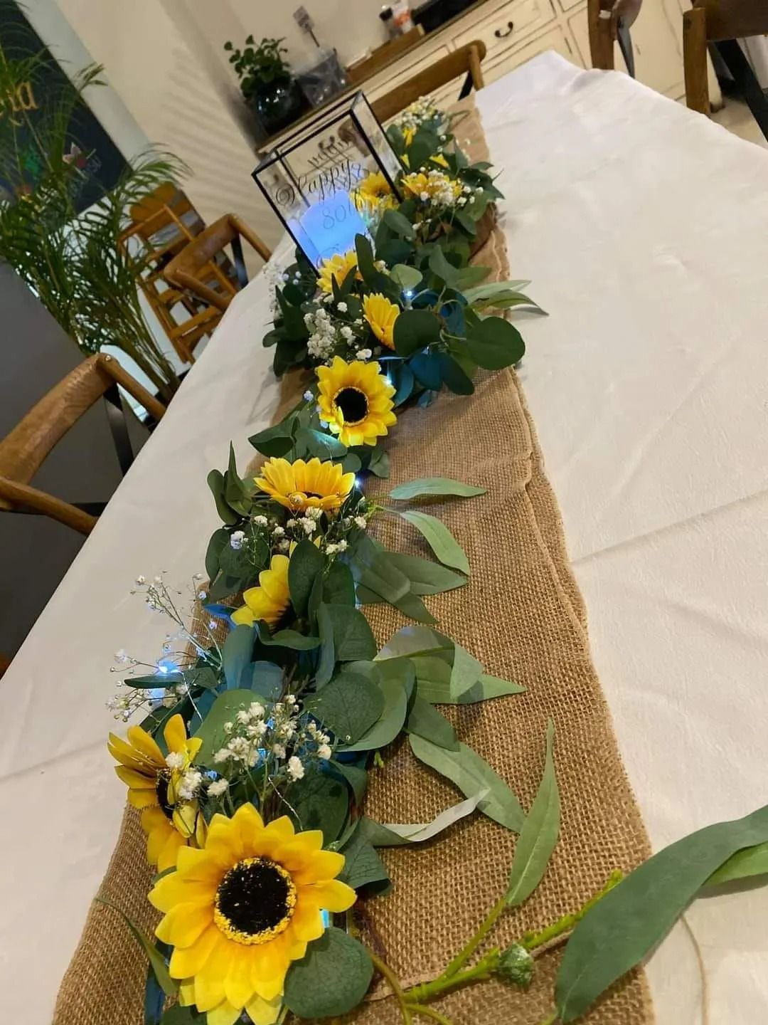 Table Centerpiece With Sunflowers, Greenery — Creative Events Innisfail in Innisfail, QLD